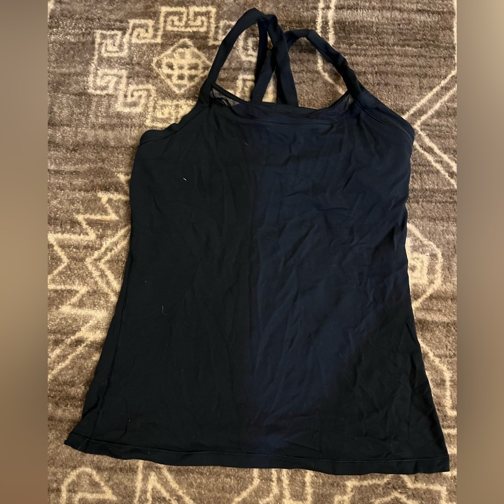 Lululemon sports top with built in bra. Only worn a couple of times.